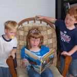 100_5693 Caught her reading to them when they thought I wasn't looking. Love it!!!